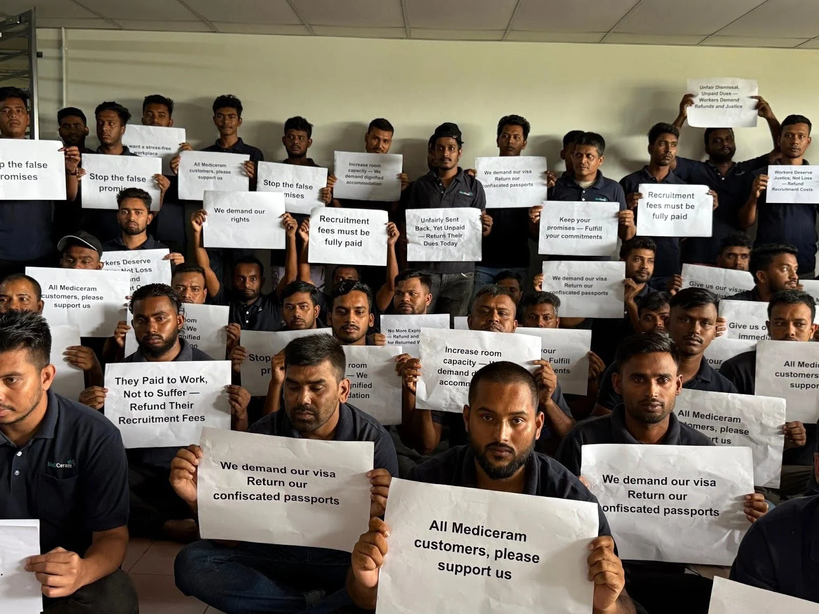 Around 190 Bangladeshi Migrant Workers at Mediceram Dismissed for Demanding Fair and Dignified Working Conditions 3 Pekerja Mediceram telah beberapa kali mengadakan mogok bagi menuntut bayaran yuran pengambilan dan gaji yang tertunggak. Mereka bekerja dalam keadaan seperti hamba—pasport dirampas, gaji lewat, visa tidak diperbaharui dan sering diugut oleh majikan. Walaupun berulang kali memprotes, majikan tidak menunaikan janji dan pihak berkuasa gagal mengambil tindakan tegas.