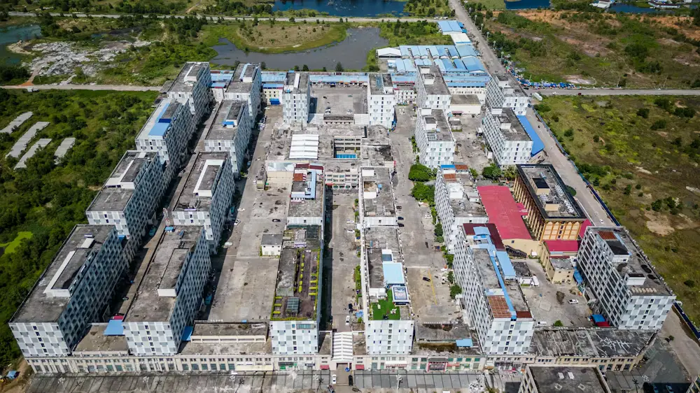 Scam Slavery in the Death Agony of Capitalism 10 What appears to be ordinary high-density commercial and residential blocks in Cambodia is in fact one of many large-scale scam compounds in the country. (Source: Cebu Daily News)