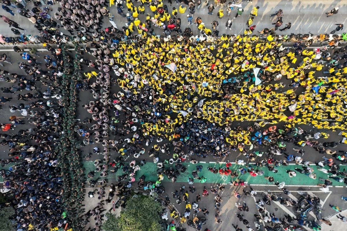 Youth in Jakarta, Indonesia take to the streets to protest the failure of the government to solve the economic crisis.